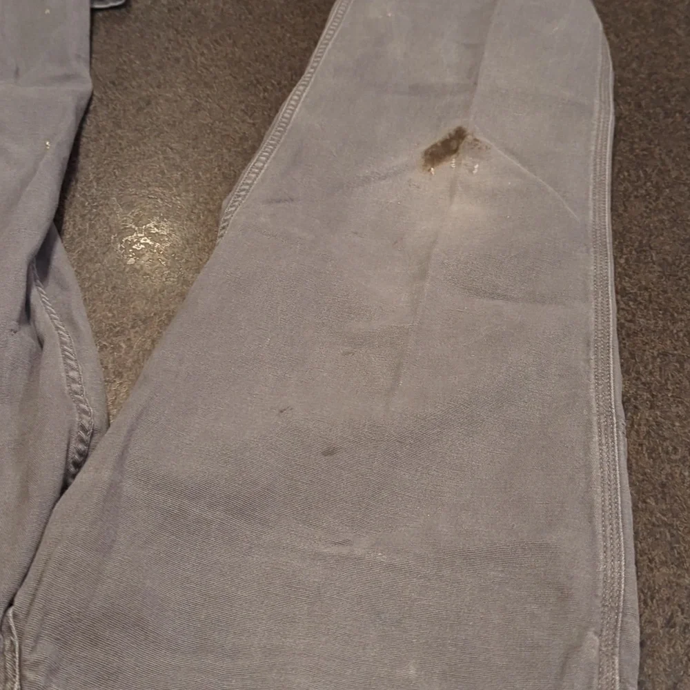 Carhartt Rugged Flex Canvas Work Pant With Caulking And Grease Marks - Picture 6 of 12
